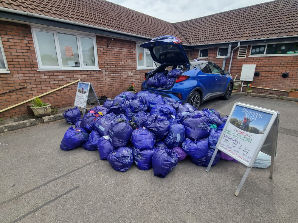 153 purple bags waiting to be collected 