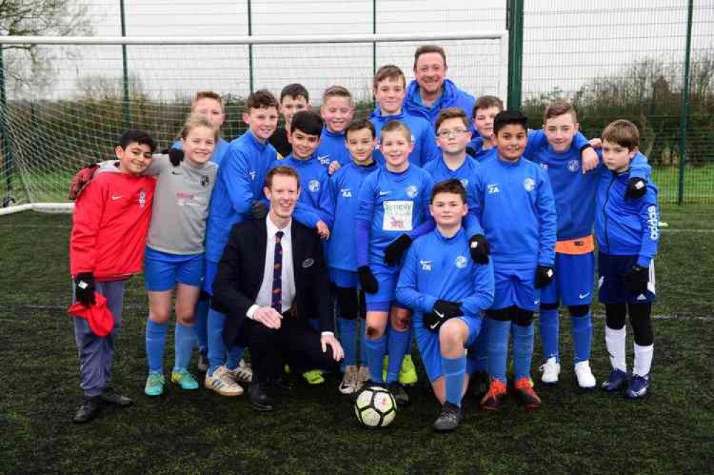 Bellway sales advisor, Stephen Betts with Bardon Hill Juniors FC