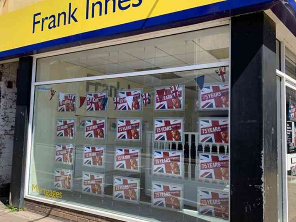 Frank Innes estate agent in Belvoir Road is marking VE Day 75 with Union Jack flags in its front window