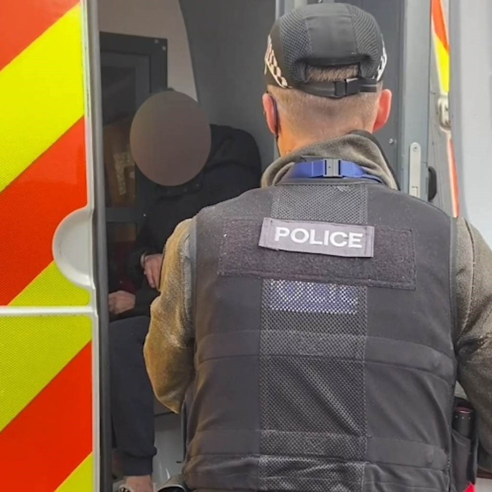 A man is arrested following the execution of warrants