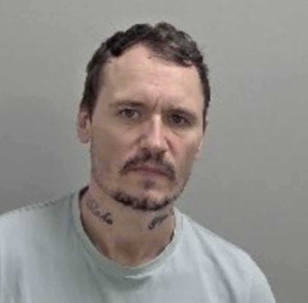 Police seek Glenn Darby, 41, wanted for breaching licence terms (image via Leamington Police) 