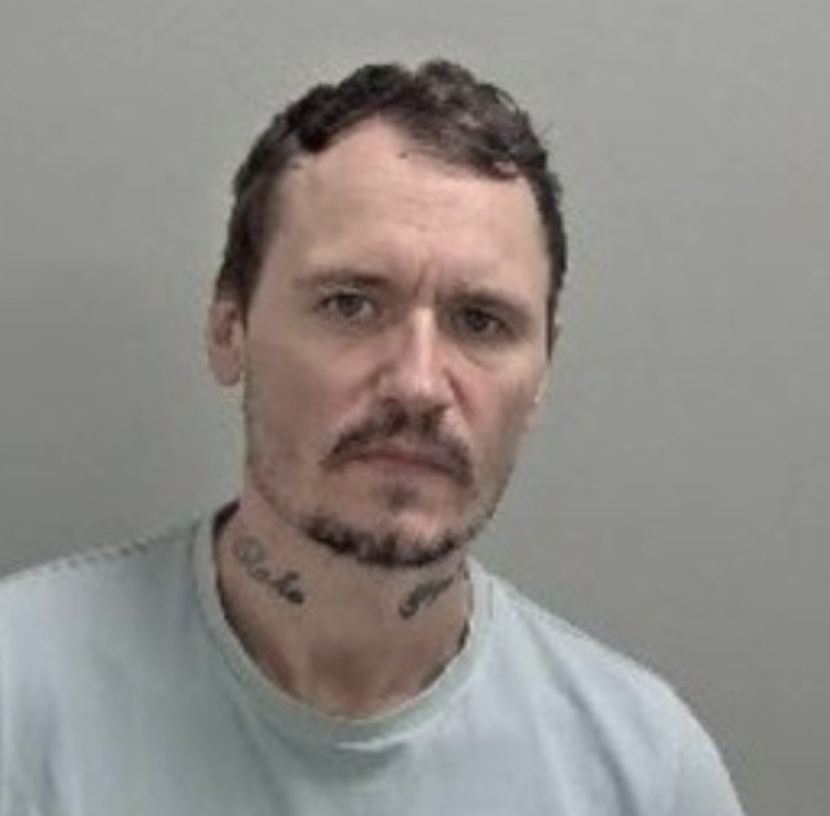 Police seek Glenn Darby, 41, wanted for breaching licence terms (image via Leamington Police) 