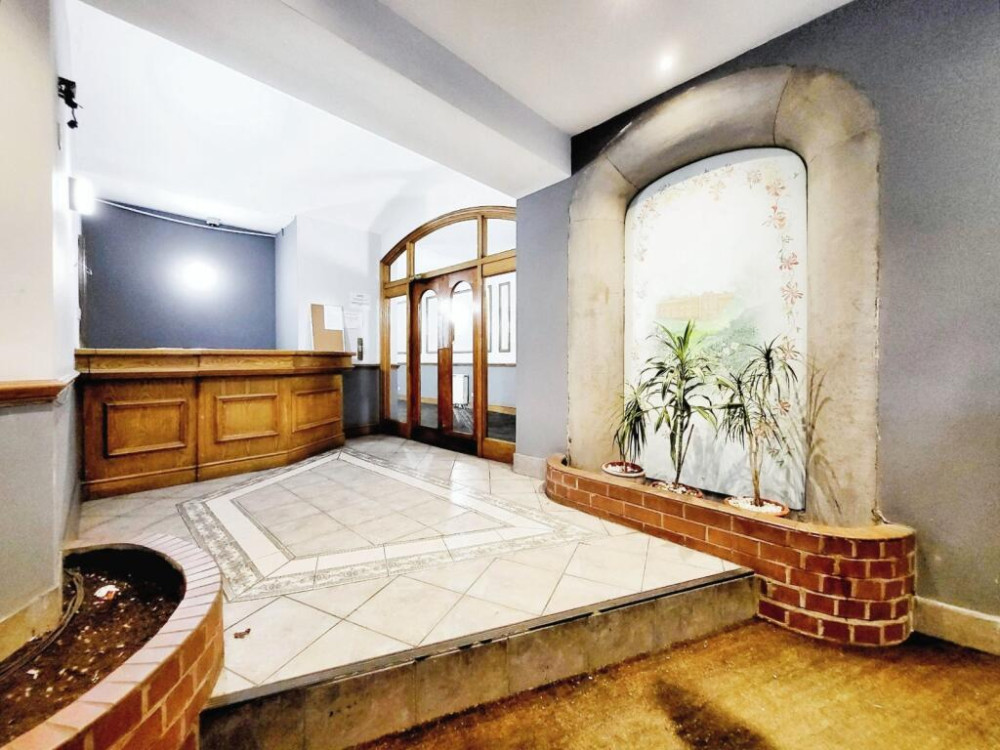 Our friends and sponsors at Julian Wadden present their property of the week - this spacious apartment in the historic Wellington Mill in Stockport town centre (Image - Julian Wadden)