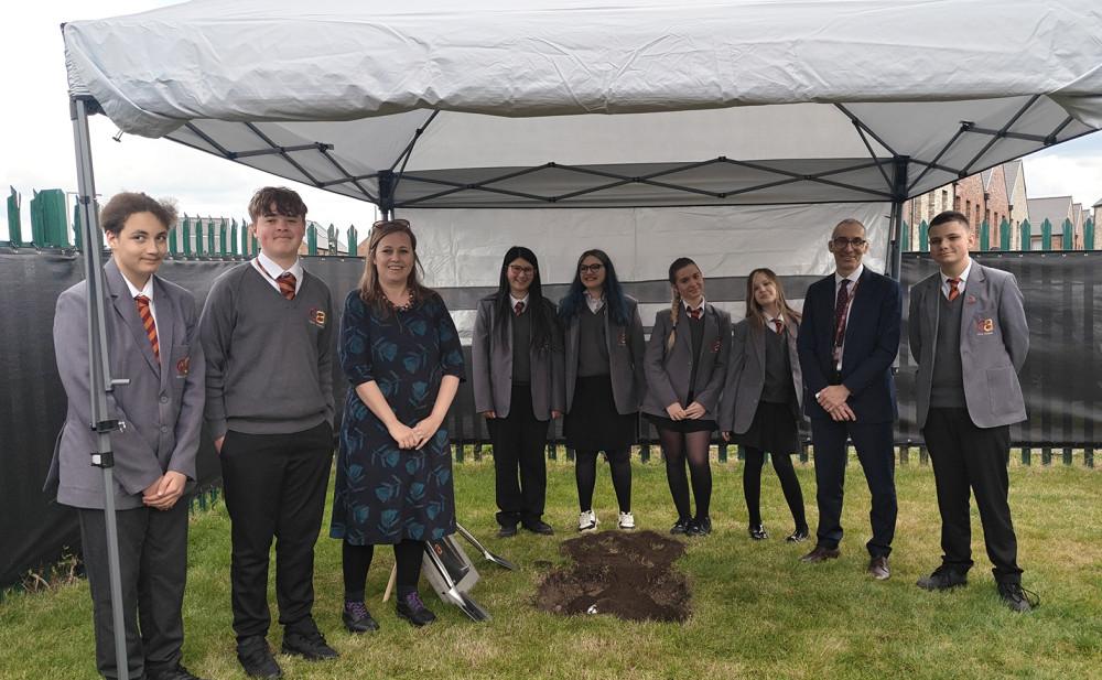 Jen Craft and Mark Vickers with students. 