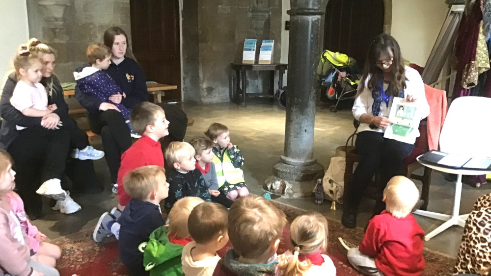 Children from Stepping Stones Pre-School sitting spellbound during one of the storytelling sessions. (supplied) 