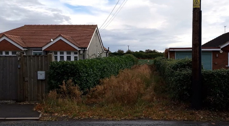Proposed access to the site off Broad Lane, which would see the property on the left demolished (Photo: CEC Planning).