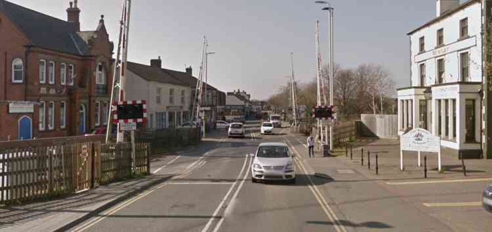 The barriers at Coalville's level crossing in High Street. Photo: Instantstreetview.com