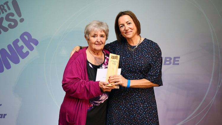 Winner of the Volunteer of the Year Award, Mary Dutton from Brinnington Community Centre, collects her Award presented by Jo McGrath, CEO of Sector 3 (Image supplied)