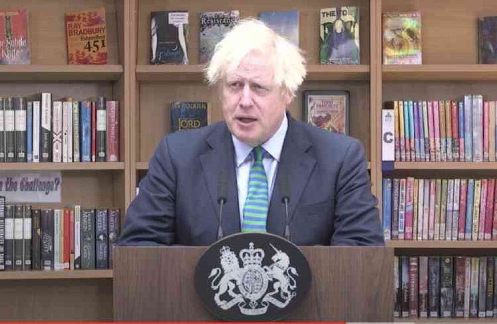 Boris Johnson spoke to students but the titles of the books on the shelves caught the eye of viewers. Photo: No10 Downing Street You Tube page