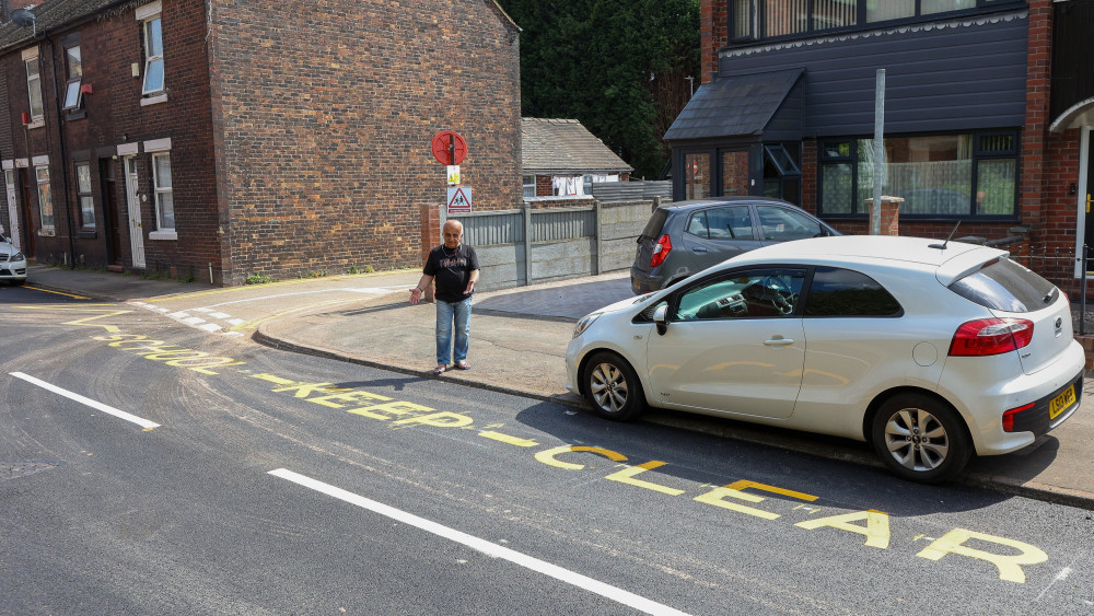 Residents were baffled after the yellow markings appeared outside their homes on Greendock Street, Longton (image via SWNS)
