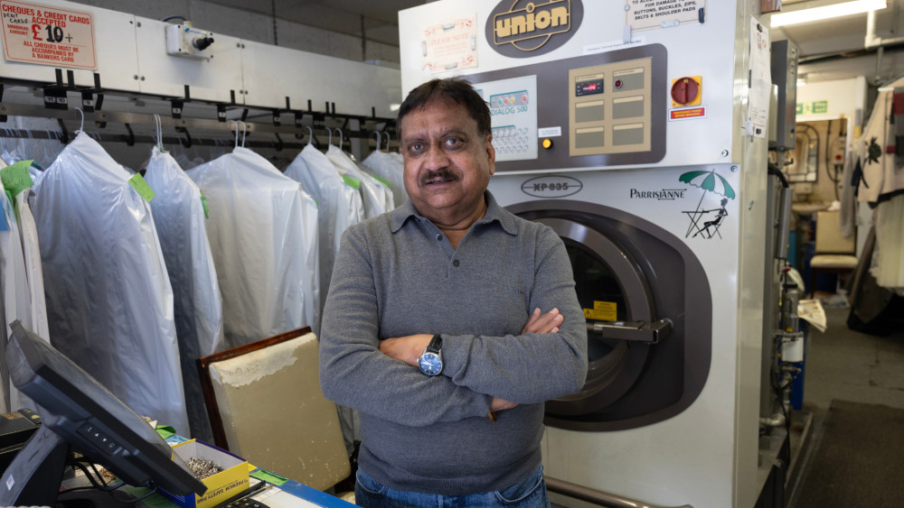 Raj Mudhar, 65, at Pristine Dry Cleaners, in Teddington (credit: Facundo Arrizabalaga/MyLondon).