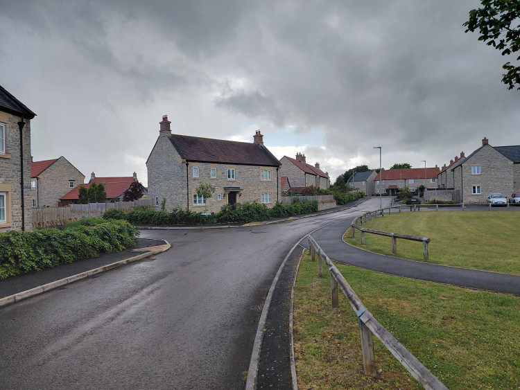 Somerset Council has taken legal action over unpaid housing contributions linked to a development later taken on by Glastonbury-based Galion Homes.