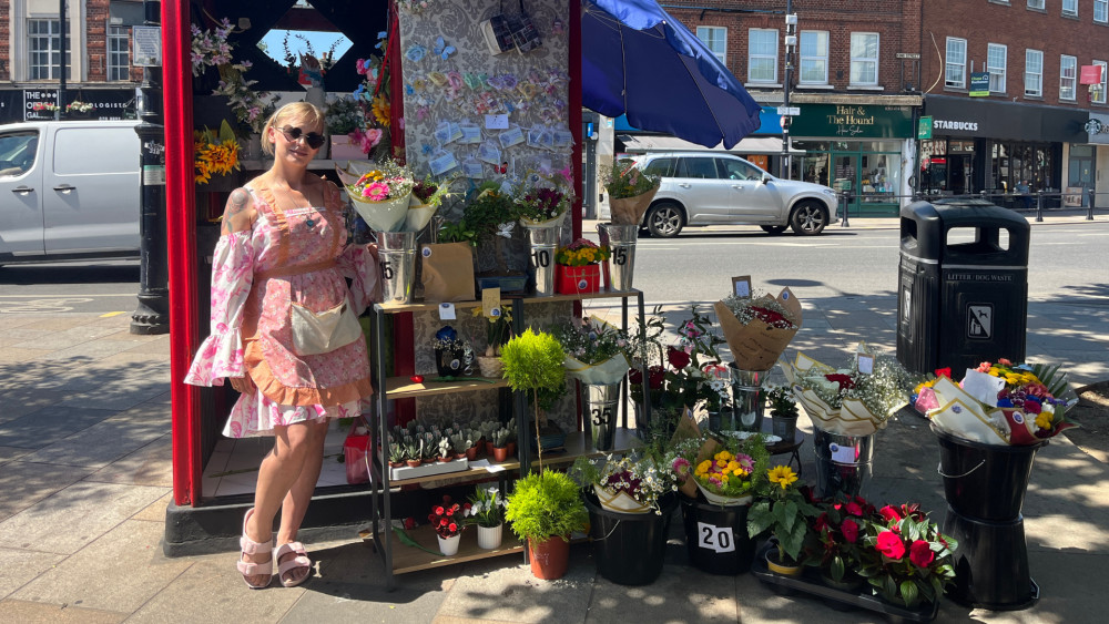 Anna Cieslak, local florist stood next to her flower stall (credit: Charlie Speed).