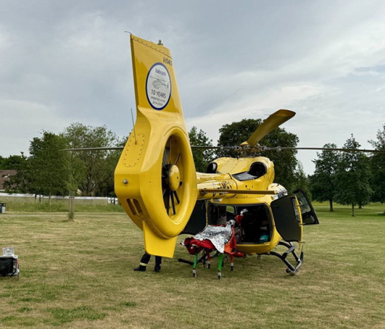 Air Ambulance on Butts Close waits to receive a casualty - Credit: Simon Maddison