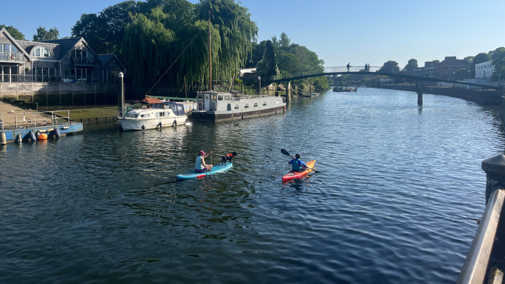 Residents paddle boarding along the River Thames (credit: Charlie Speed).