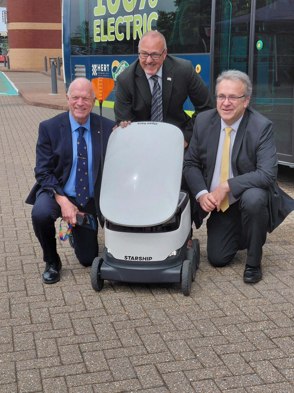 Starship robot showcased to members of Hertfordshire County Council. Pictured (l-r) are Cllr Stephen Giles-Medhurst, Cllr Adrian England and Cllr Paul Zukowskyj