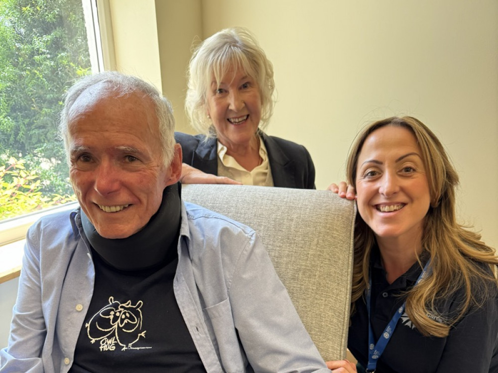 Natalie Cassidy smiles with patient Kent Allen and his wife  (image: Big Mountain Productions)