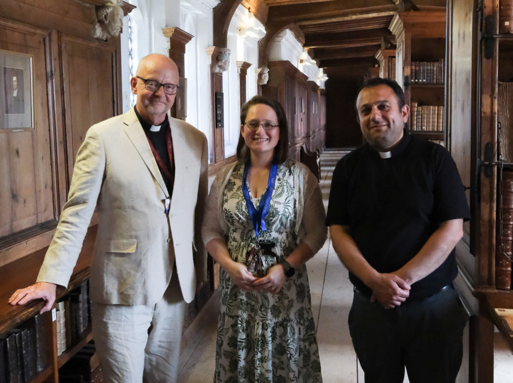 Father Ayoob Adwar visited Wells Cathedral's Chained Library after saving ancient manuscripts from Iraq.