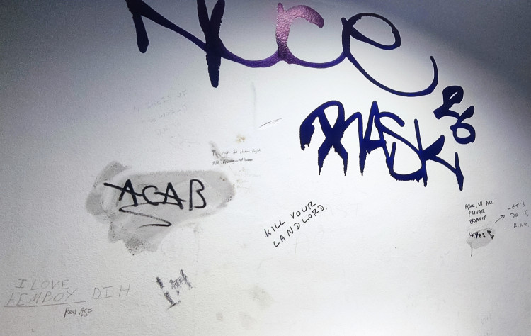 Graffiti is being allowed to build up across every surface at Crewe Bus Station's men's toilets (Photo: Nub News).