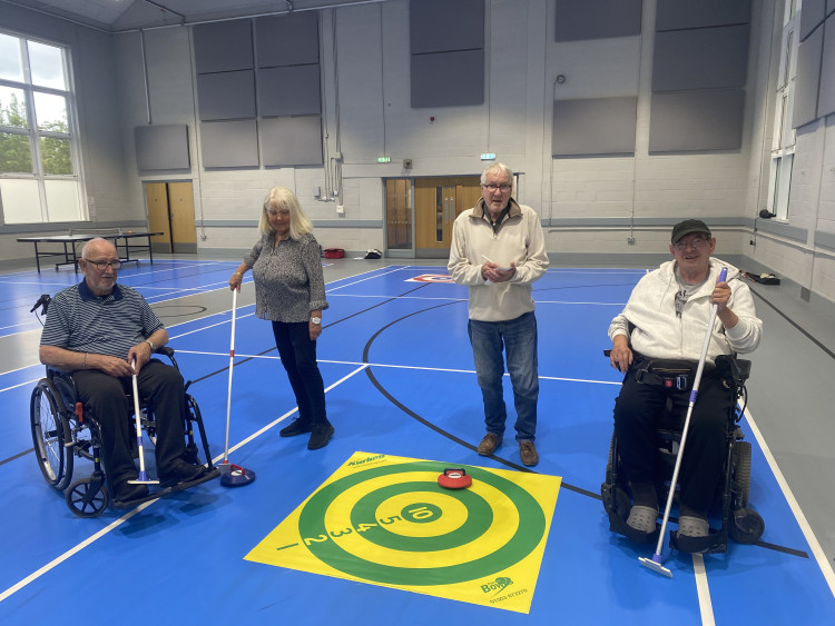 Pictured a group from the Heathcote Community Hub enjoying their regular  Thursday ‘Kurling’ session (image supplied)