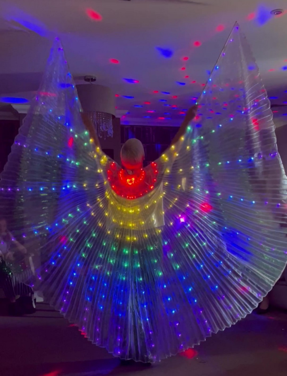 Tina Blackwill, The Pom-Pom Lady, delighted residents at Crandon Springs Care Home with her illuminated butterfly wings finale.
