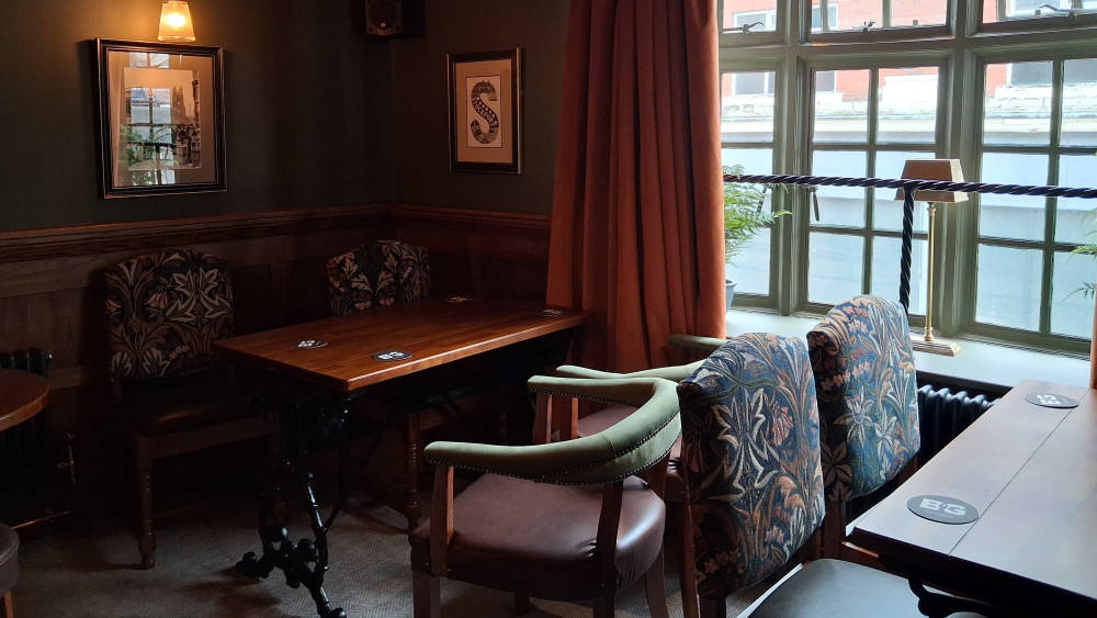 The Swan with Two Necks, a traditional pub in Stockport town centre, has unveiled a cosy new upstairs room (Image - Ian Burke)