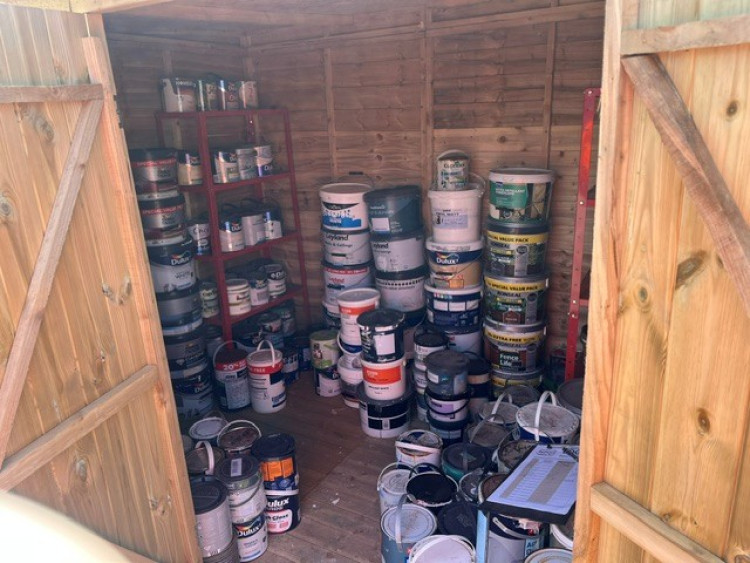 Paint at the waste recycling centre. 