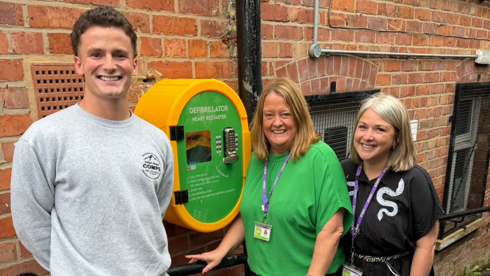 Gill and Bethan of Signpost for Carers with High Peak Comps owner Charles Edwards (Image - High Peak Comps)