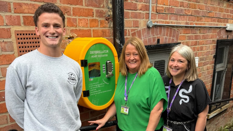 Gill and Bethan of Signpost for Carers with High Peak Comps owner Charles Edwards (Image - High Peak Comps)
