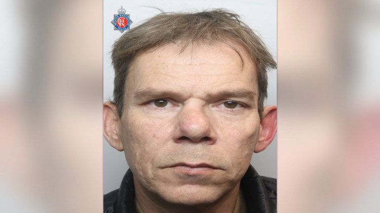 Police are appealing for information to help find 48-year-old Joseph McGuire, a wanted man with links to Stockport (Image - GMP)