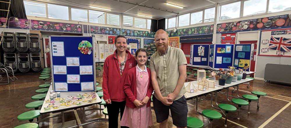 Proud mum Sarah Harrison, daughter Annabel who showed Nub News around the exhibition and Art and DT lead Andrew Hayles