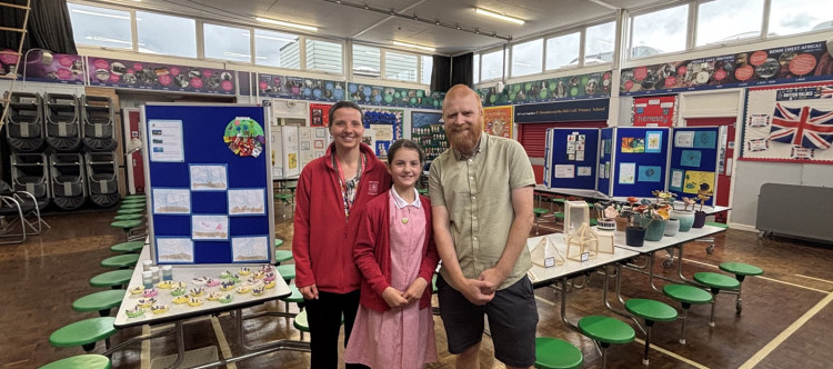 Proud mum Sarah Harrison, daughter Annabel who showed Nub News around the exhibition and Art and DT lead Andrew Hayles