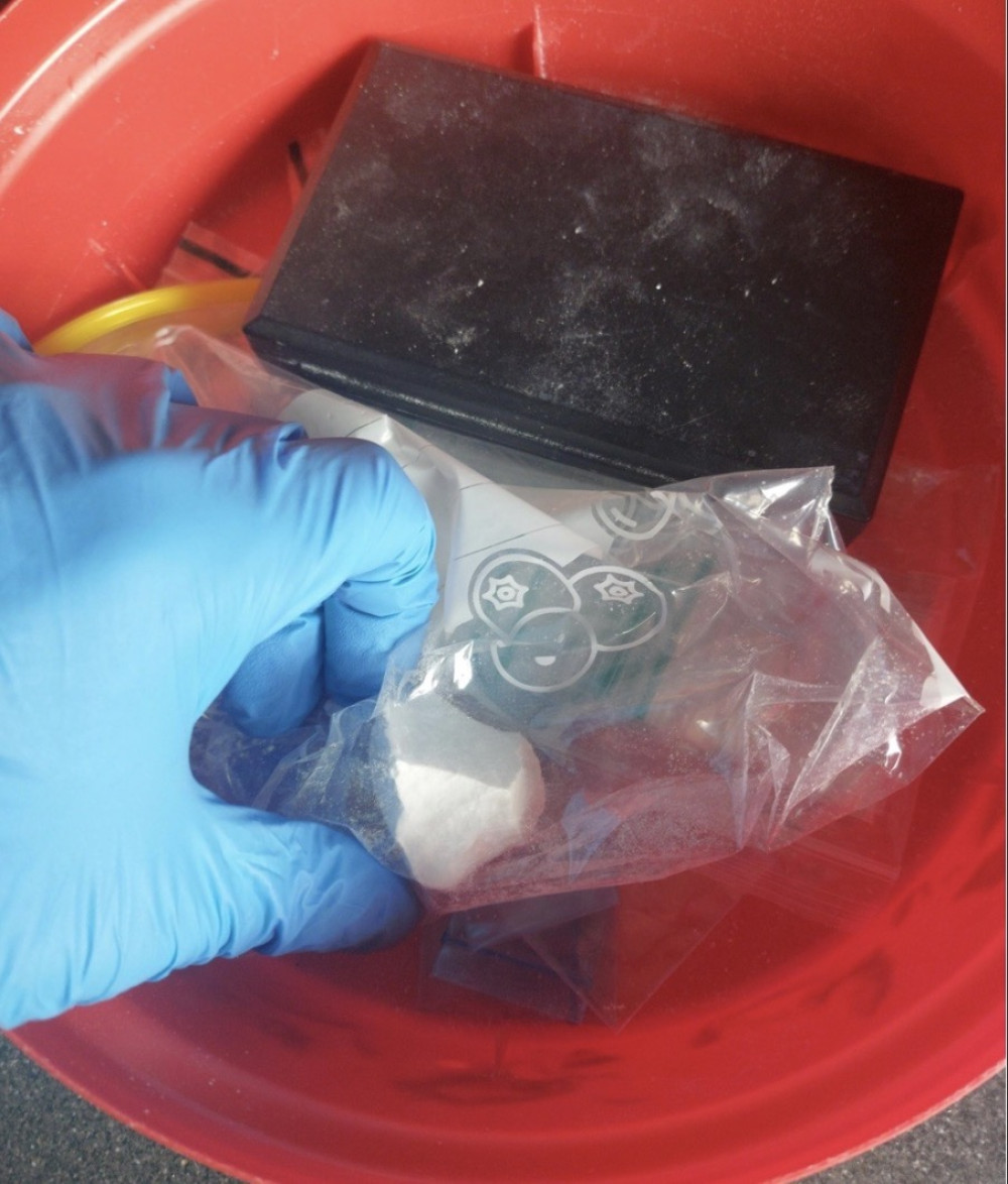 During the search, police discovered and seized a large solid crystal substance, believed to be a Class A controlled drug, weighing approximately 18 grams