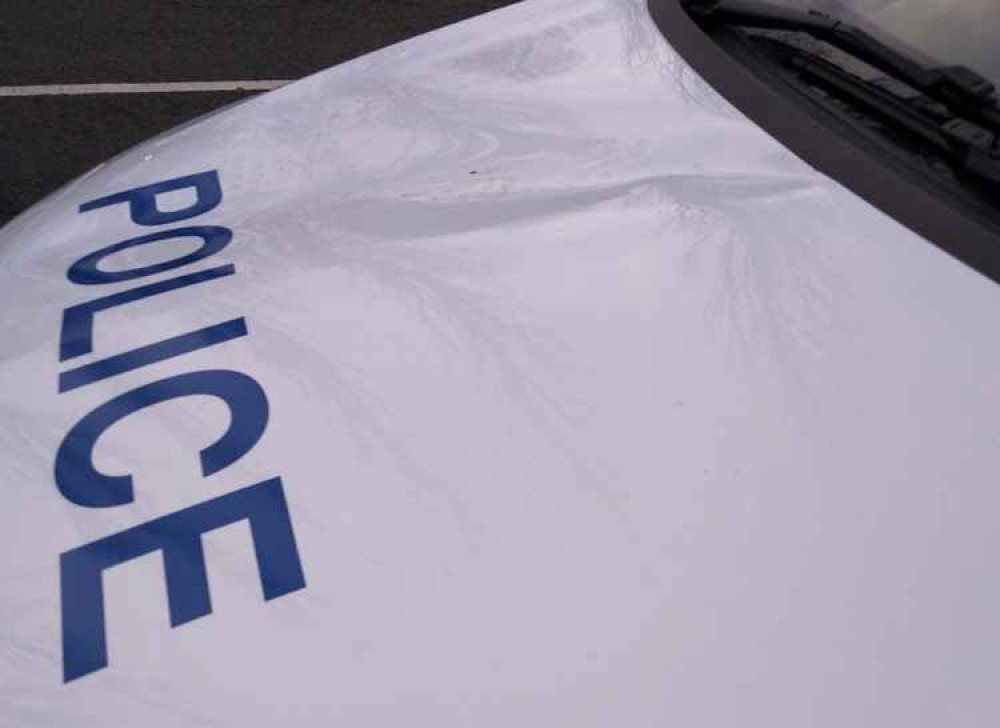 The police car's bonnet was left dented by the person who jumped on it. Photo: North West Leicestershire Police