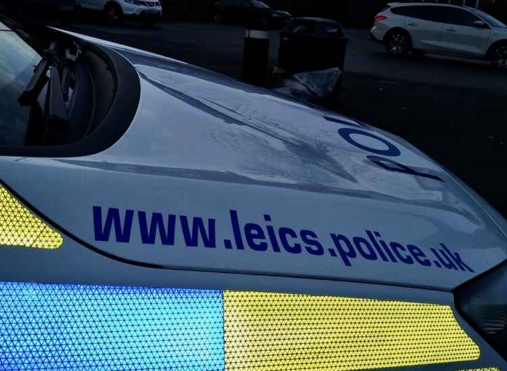 The police car's bonnet was left dented by the person who jumped on it. Photo: North West Leicestershire Police