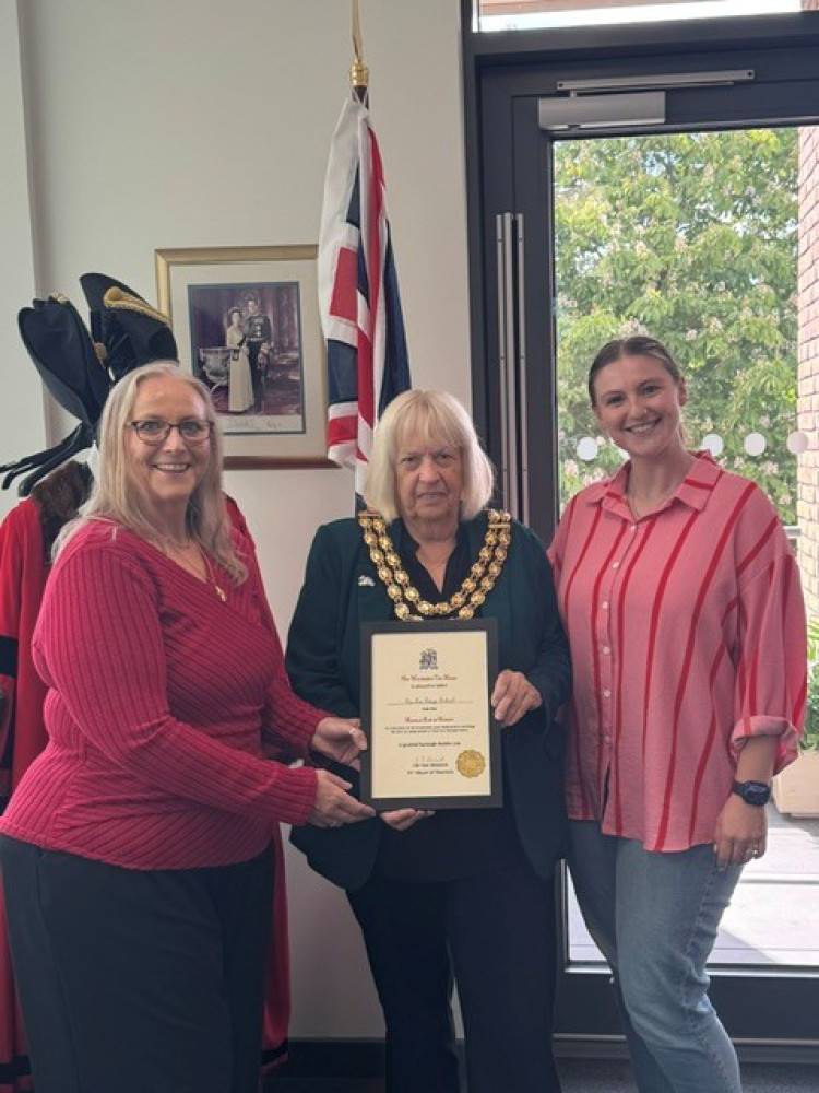 Tip Toe being enrolled in the Mayoral Roll of Honour last month.