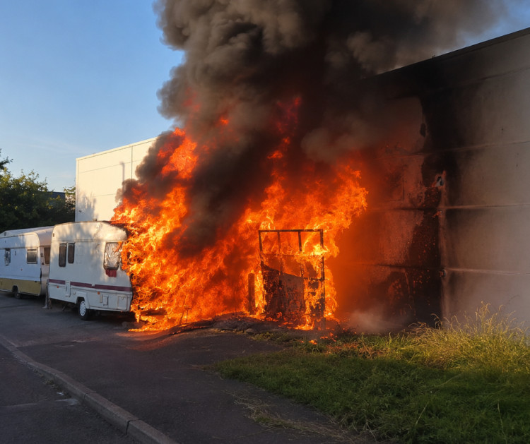 Two caravans were deliberately set alight near Wirral Park Road, prompting a five-engine response. ((LL/DILY))