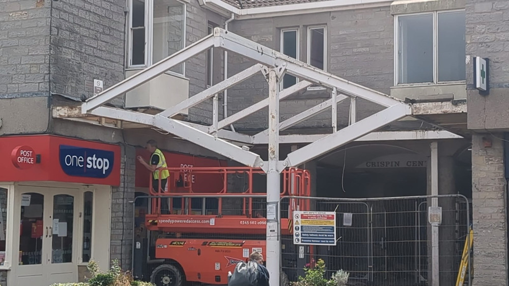 Work has begun on removing the Crispin Shopping Centre canopy as the Street redevelopment moves forward. (PL/DILY) 