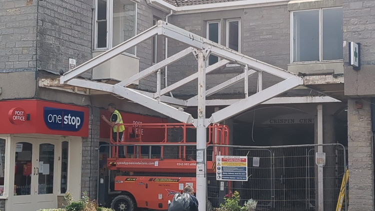 Work has begun on removing the Crispin Shopping Centre canopy as the Street redevelopment moves forward. (PL/DILY) 
