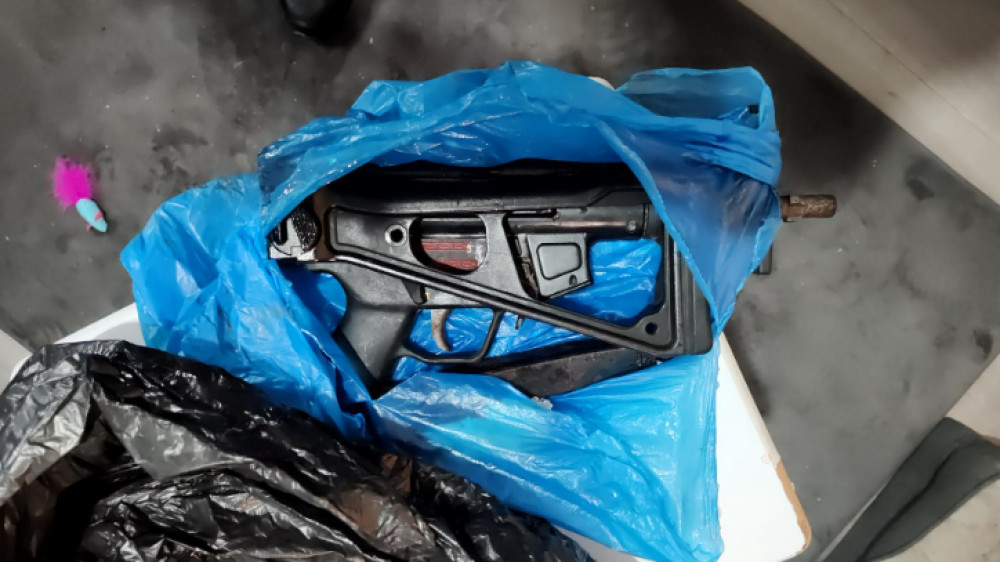 The MP5 sub-machine gun was seized by police, with investigations ongoing (Image - GMP)