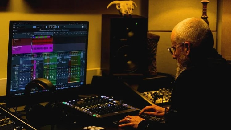 High Peak Recordings' owner and manager Bon Holloway at work on a track in the studio (Image - Otto Mendelsson)