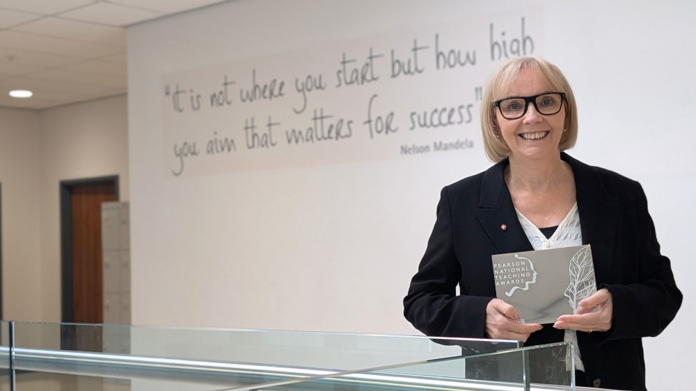 Linda Magrath OBE holds her Silver Lifetime Achievement Award (Image supplied)