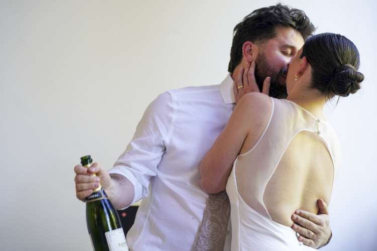 A savvy bride from Macclesfield bought her dream wedding dress for £5 from a charity shop and confetti from Vinted - for a ceremony costing less than £5,000 (Credit: SWNS)
