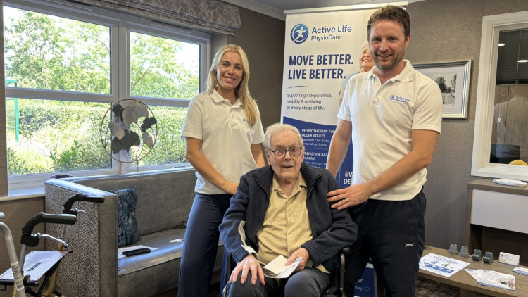 Ella Howells and Jason Curtis with a Shoemaker Place resident (image via Nub News)