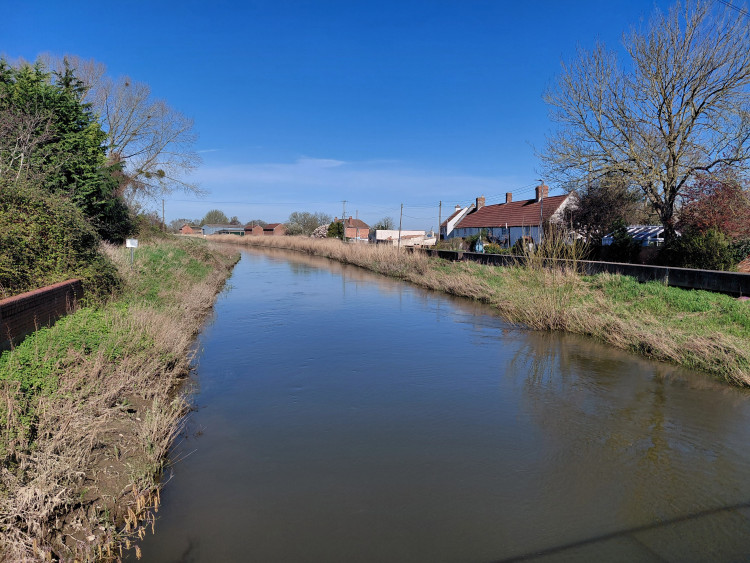 A Somerset drainage board figure says housing developer money should help pay for permanent flood pumps after Storm Chandra flooding.