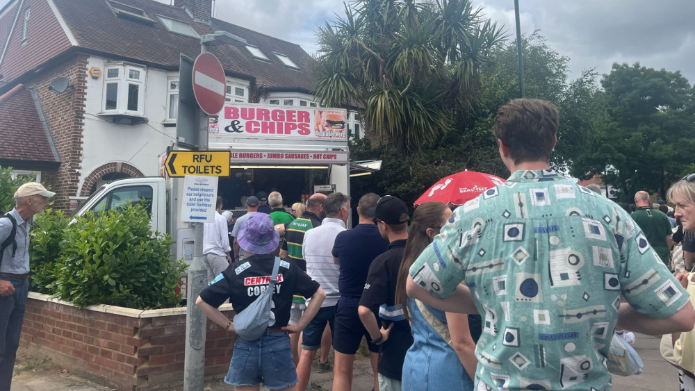 Fans queueing at Burger & Chips during the Gallagher Premiership rugby final between Northampton and Exeter on 20 June (credit: Charlie Speed).
