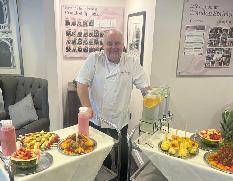 a)	Head Chef Simon displaying some of the healthy, tasty drinks and fruit platters he created to help residents at Crandon Springs Care Home stay hydrated during the warm weather.