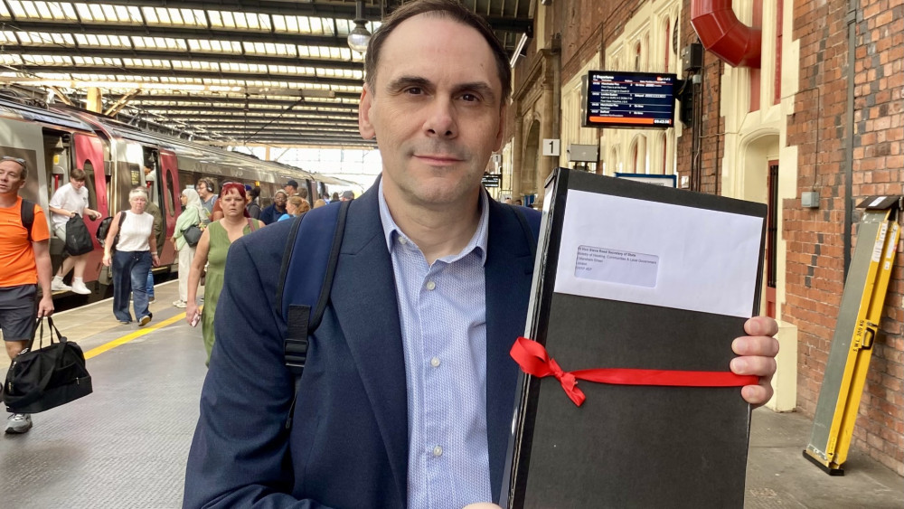 Councillor Simon Tagg, leader of the Conservative Opposition Group on Newcastle Borough Council, With The Save Our Borough Petition. (image via Simon Tagg)