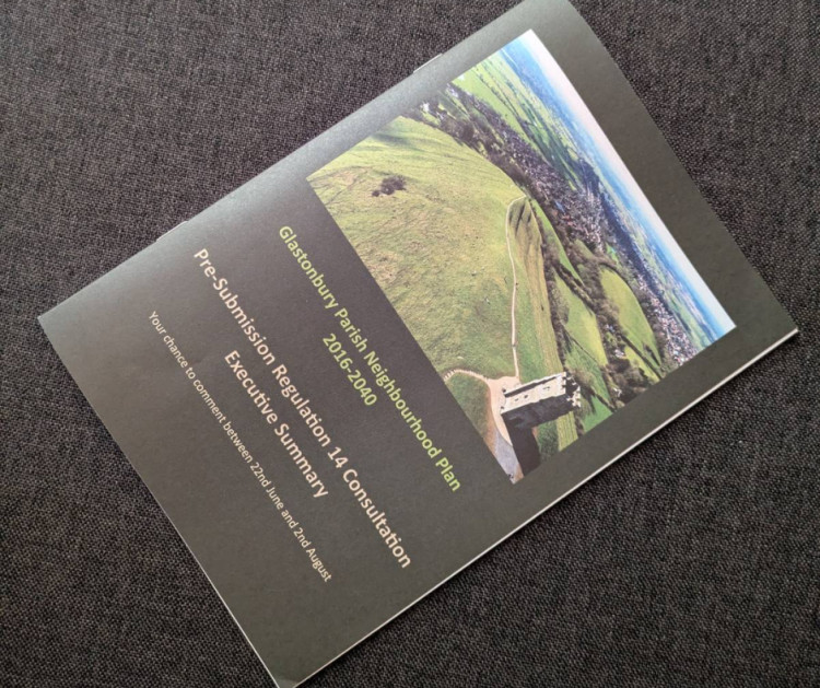 Glastonbury's draft neighbourhood plan outlines growth and preservation goals for 15 years, focusing on housing, green spaces, flooding, tourism, and local character.