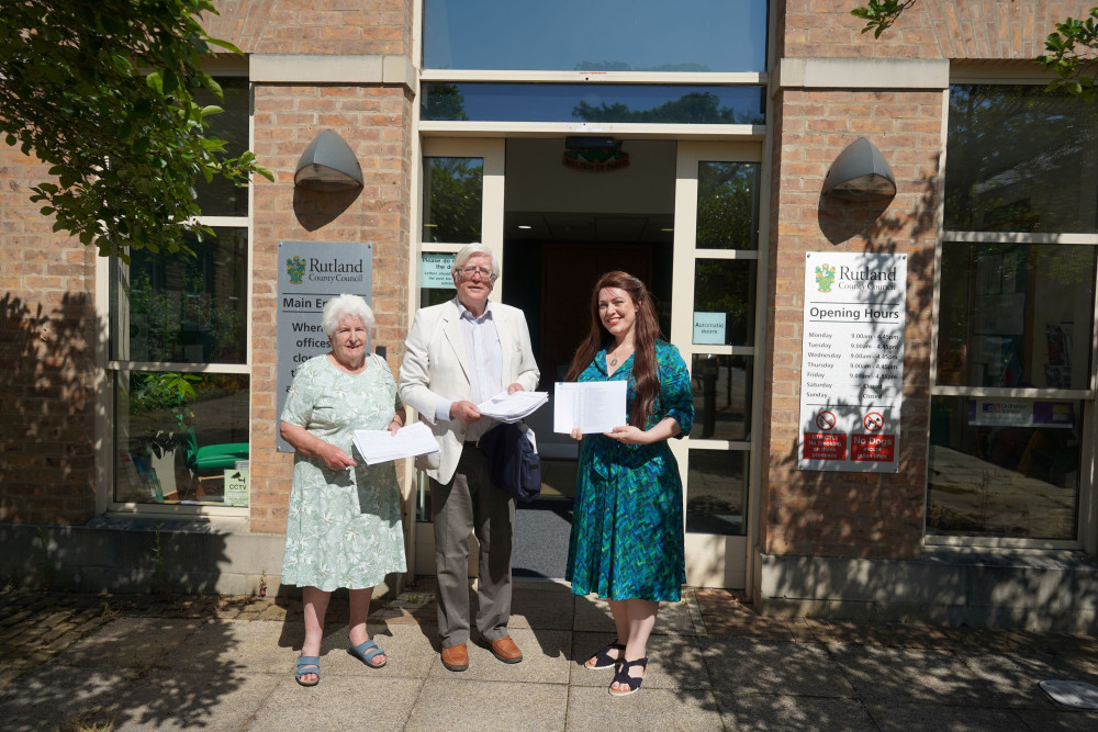 Lawrence Fenelon, Chairman and Judy Geer, Hon. Secretary of the Friends of Rutland County Museum and Oakham Castle together with MP Alicia Kearns about to hand in the Petition  to Rutland Council